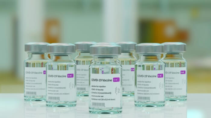 covid-19 vaccine vials with labels